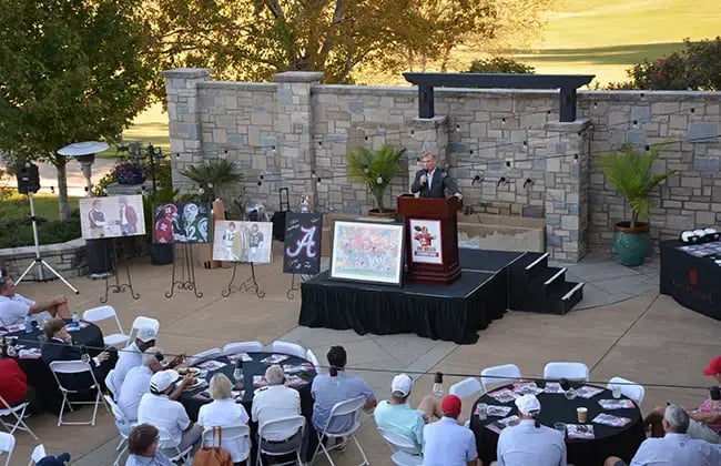 art auction on outdoors patio at ggcc