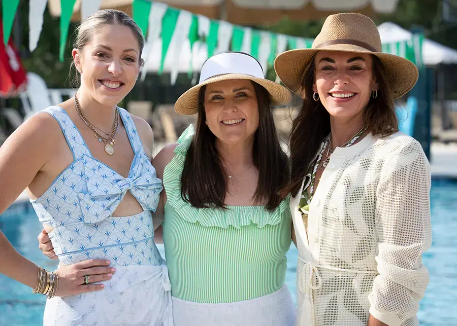 3 young ladies smiling socializing